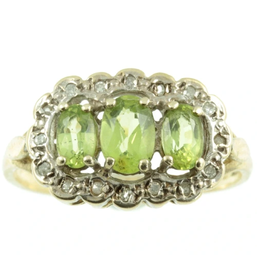 Gorgeous 3 stone peridot and diamond ring