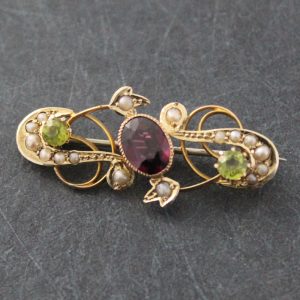 garnet and peridot brooch