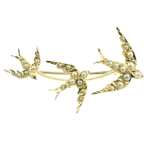 Edwardian 15ct gold swooping swallows brooch