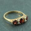 Victorian 9ct gold garnet and pearl ring