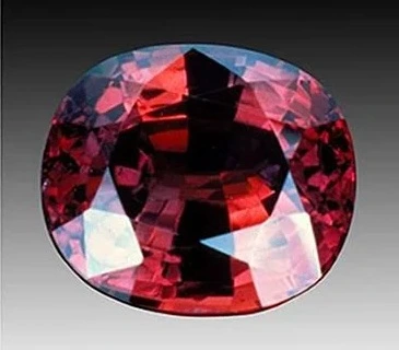 Alexandrite Gemstone in incandescent light Alexandrite Gemstone in incandescent light